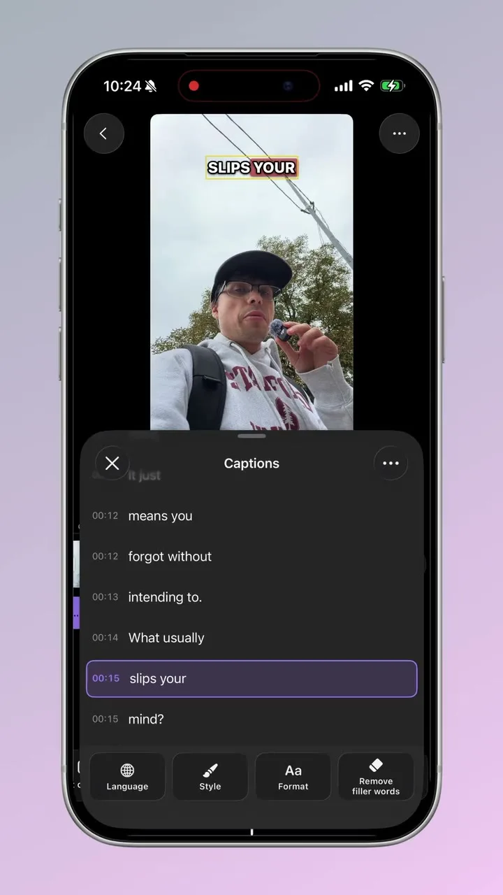 Captions Bro caption editor showing a generated transcript with per-word timing on iPhone